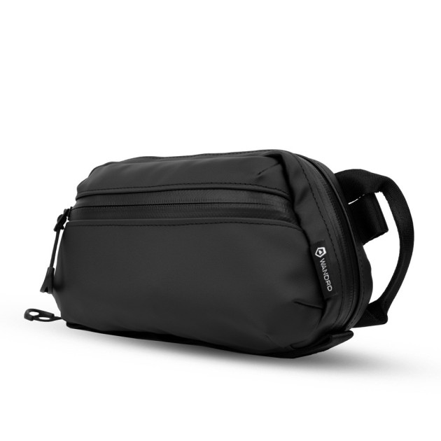 Tech Bag medium orange Wandrd pour objectif - Concept Store Photo