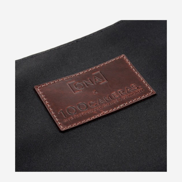Ona Prince Street toile cirée Noire, sac photo messenger